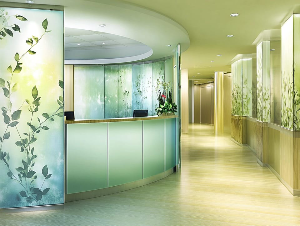 Commercial wallcovering applications on walls, glass partitions, and architectural surfaces