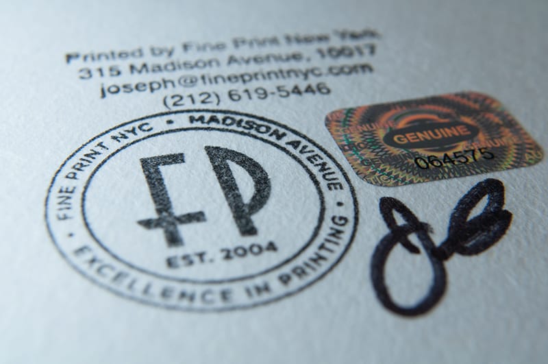 closeup image of a certified print with stamp and seal of quality