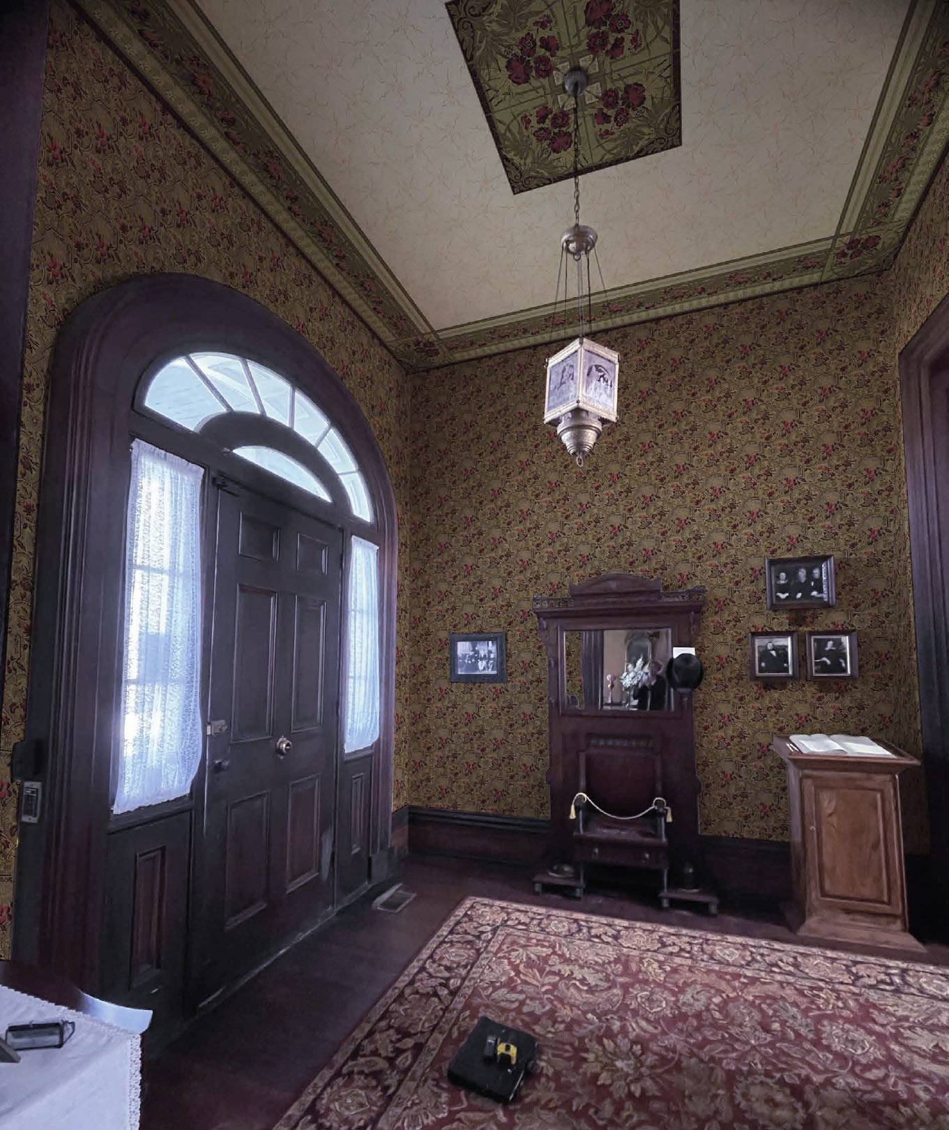 The recreated 1882 wallpaper installed across the Glenmore Mansion foyer walls and ceiling