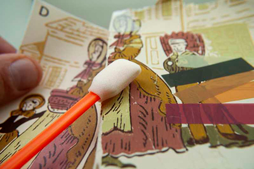 Vintage wallpaper sample being restored and reprinted to match original quality and color